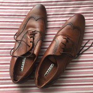 Brown Oxford style dress shoes